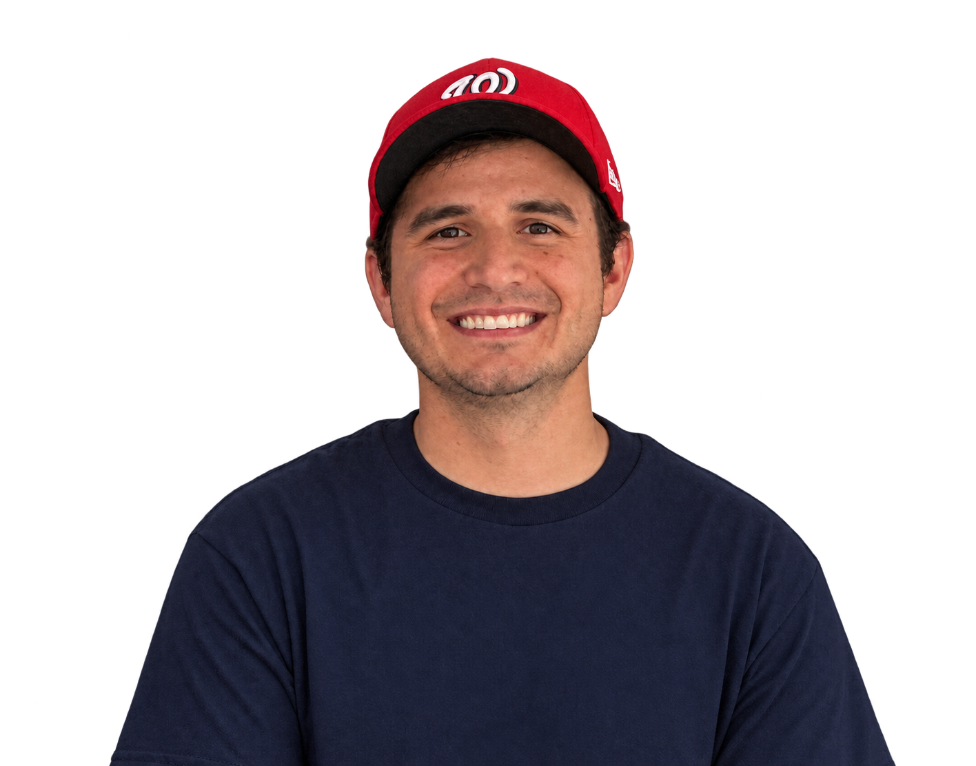 Thomas Barrows smiling in a red baseball cap